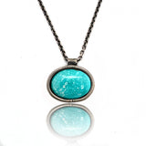 Itty Bitty - Perfect rounded oval turqouise