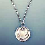 round sterling pendant