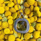 Window with Tourmaline Necklace